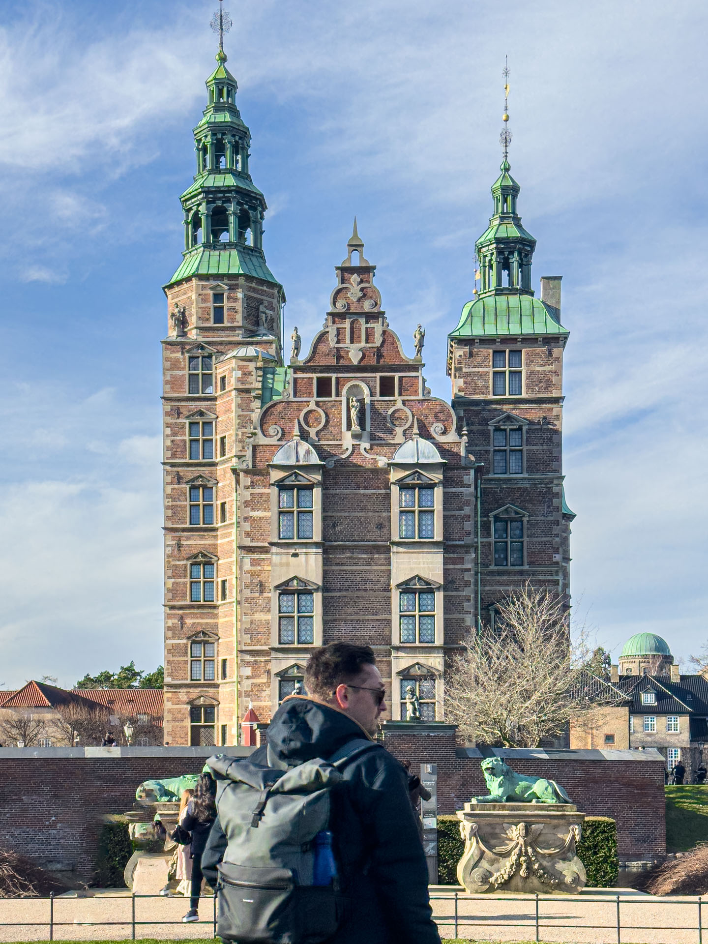 Man standing in front of Rosenborg Castle Copenhagen